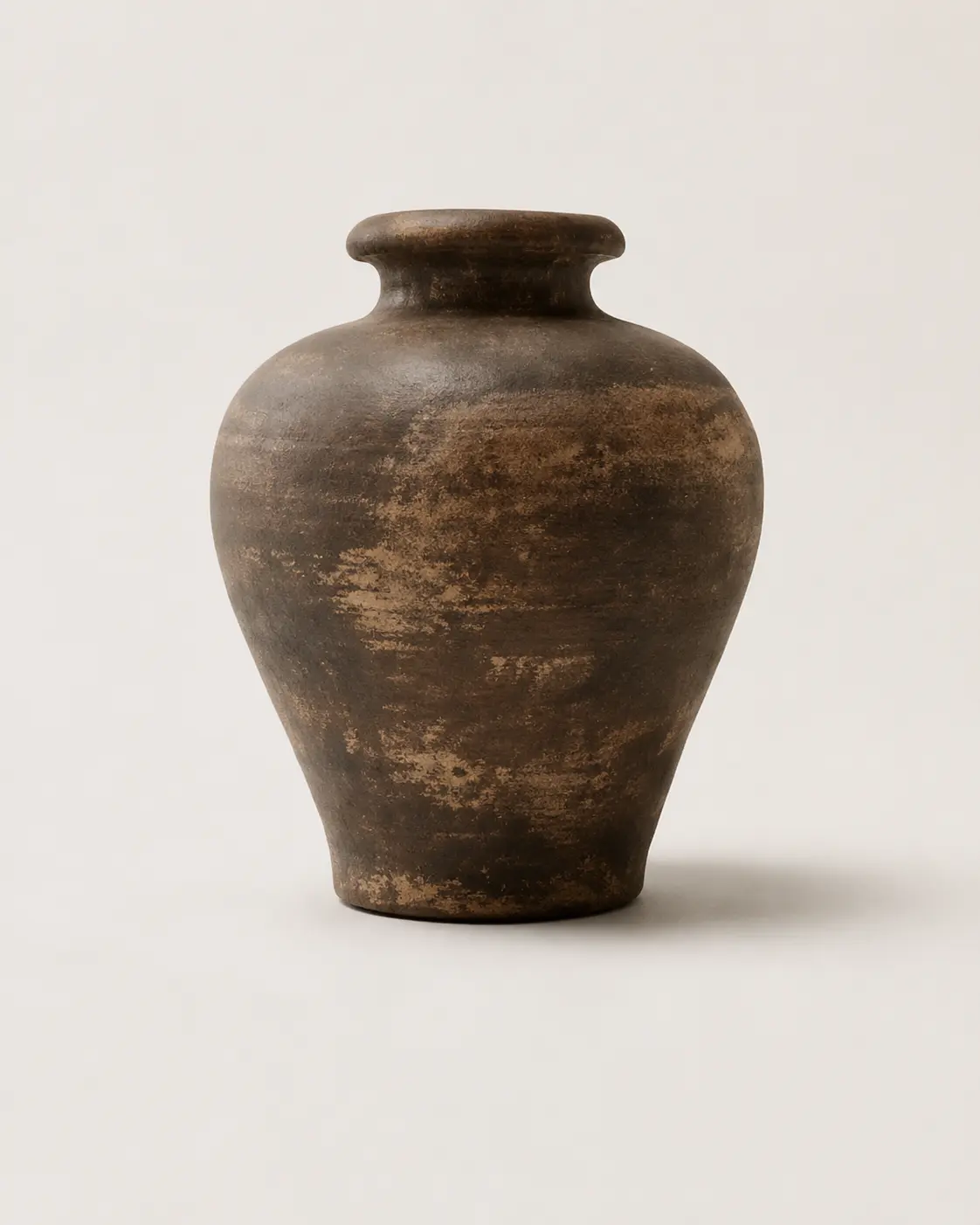 Dark hand-finished terracotta vessel