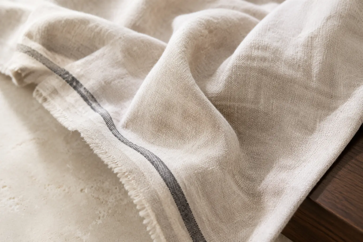 Natural ivory linen with charcoal stripe in soft daylight